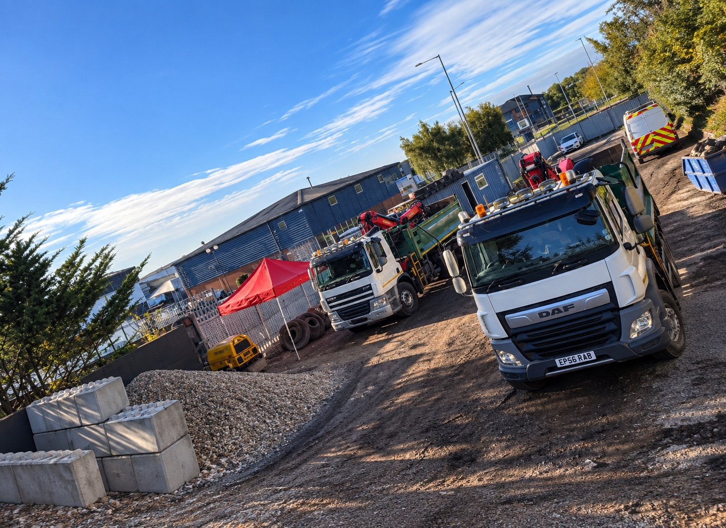 C&C grab lorries in an aggregates yard